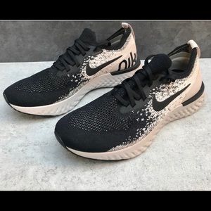 Women’s Nike Epic React Flyknit tennis shoes, size 9.